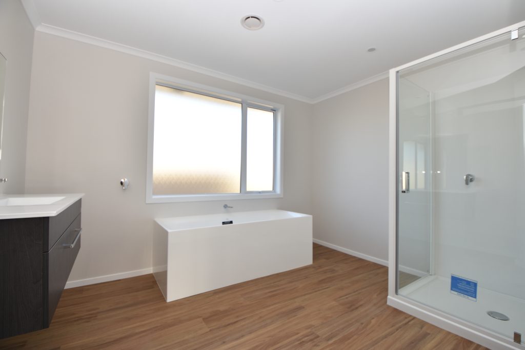 A freshly built bathroom in a new home
