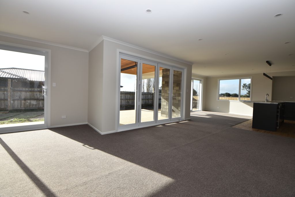 A freshly built and empty open-plan dining and kitchen space